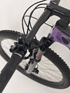 Scott Spark RC 900 Team Issue AXS Carbon bike comfortably positioned in a scenic location.