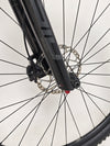 Image focused on the cross-country readiness of the Scott Spark RC 900 Team Issue AXS Carbon.