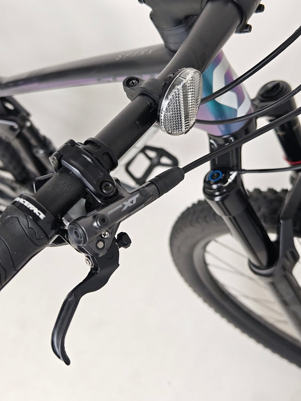 Zoomed view capturing the SRAM GX Eagle XG-1275 cassette on the Scott Spark RC 900 Team Issue AXS Carbon.