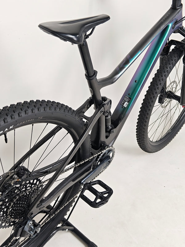 Scott Spark RC 900 Team Issue AXS Carbon bike parked on a mountain trail.