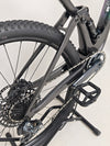 Scott Spark RC 900 Team Issue AXS Carbon positioned against a natural backdrop.
