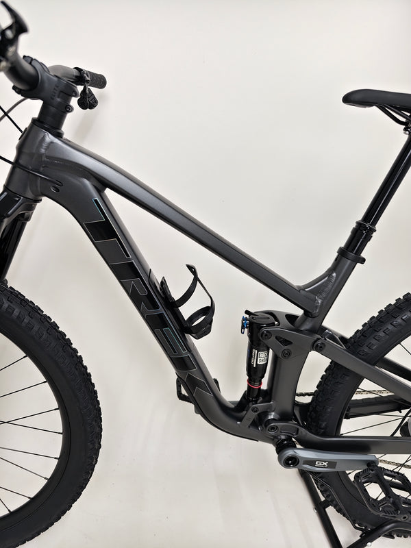 Trek Top Fuel 8 GX AXS 2024 showcasing the bike's internal storage and Knock Block 2.0 technology.