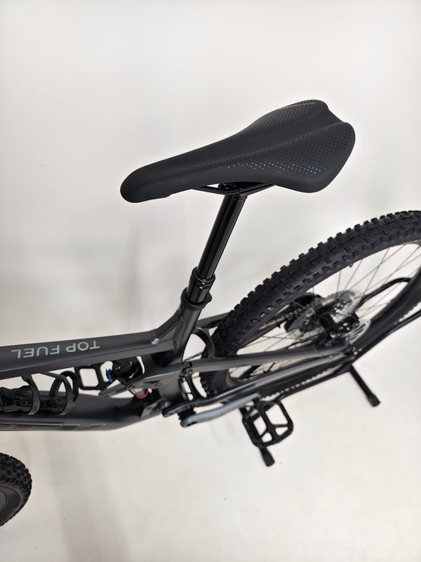 Trek Top Fuel 8 GX AXS 2024 showcasing the rear derailleur and SRAM GX Eagle AXS components.