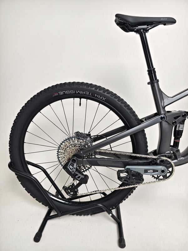 Trek Top Fuel 8 GX AXS 2024 bike presented in outdoor lighting to emphasize finish and details.