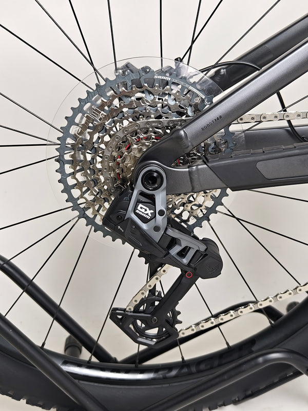 Trek Top Fuel 8 GX AXS 2024 featured during outdoor activity to depict real-world function.