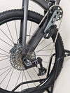 Trek Top Fuel 8 GX AXS 2024 captured from a side angle to showcase its advanced mountain bike features.