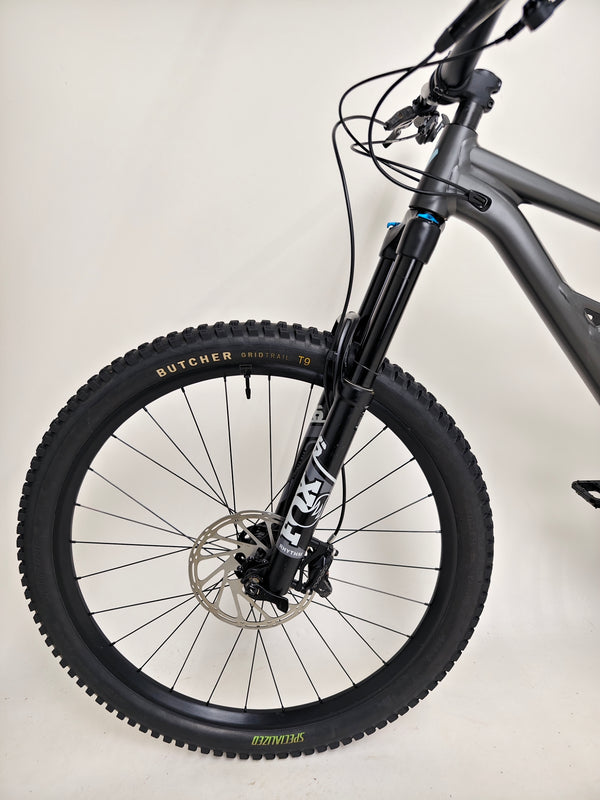 The Specialized Status 160 showcased in a bike shop setting, available for purchase.