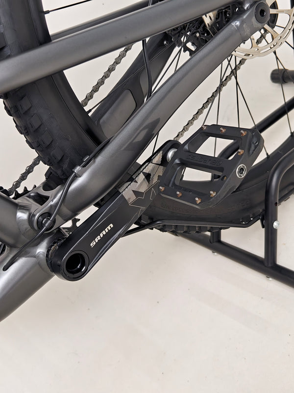 A detailed look at the shock system on the Specialized Status 160, highlighting its advanced technology.