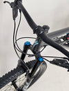 Photography of the Specialized Status 160 on an open trail, highlighting its versatility.