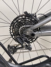 The powerful design of the Specialized Status 160 mountain bike, emphasizing its ride quality.