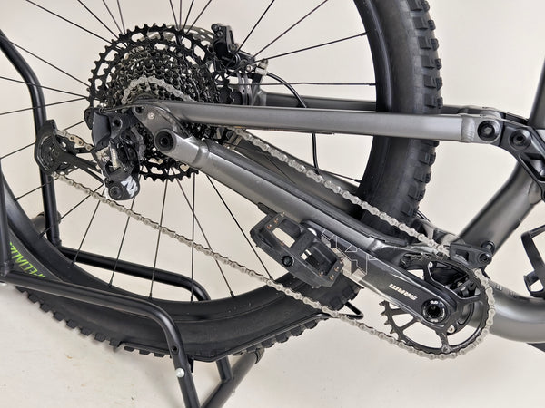 The Specialized Status 160 mountain bike poised for an ascent, ready for an adventure.