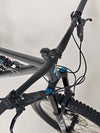 A beautifully composed shot of the Specialized Status 160 against a backdrop of nature.