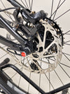 Santa Cruz Nomad Alloy R / SRAM XX1 / HOPE Hubs / E.13 / XL / Top-Spec / Very Good Condition! - Image capturing the bike in motion on a biking trail.