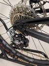 Santa Cruz Nomad Alloy R / SRAM XX1 / HOPE Hubs / E.13 / XL / Top-Spec / Very Good Condition! - Image of the bike on rugged terrain showcasing its capability.
