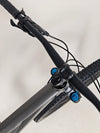 Specialized Stumpjumper EVO Comp Alloy 29/27.5 MULLET / MEDIUM S3 / Very Good Condition - Image of the bike during a downhill trail descent.