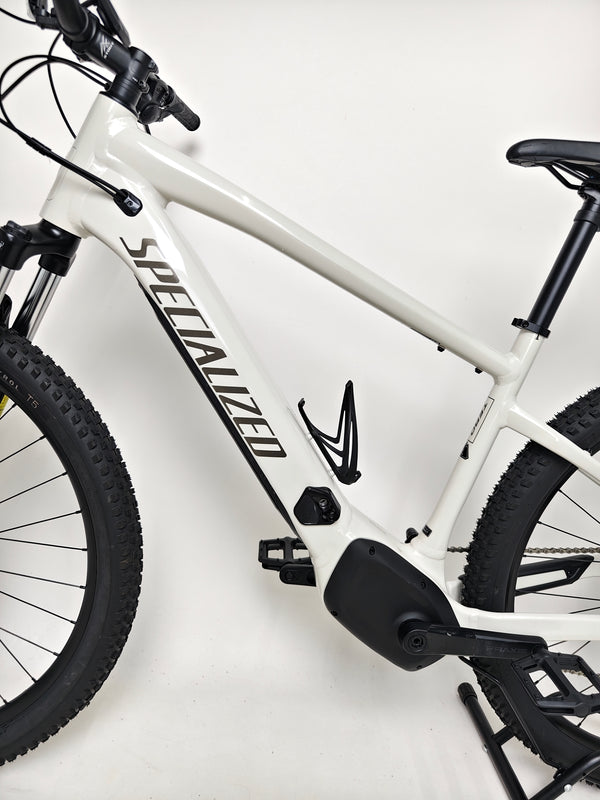 Action shot of the Specialized Turbo Tero 3.0 navigating a steep incline, demonstrating its powerful motor.