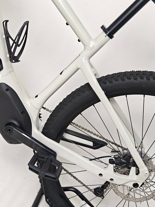 Action photograph of the Specialized Turbo Tero 3.0 navigating a technical trail, showcasing rider skill.