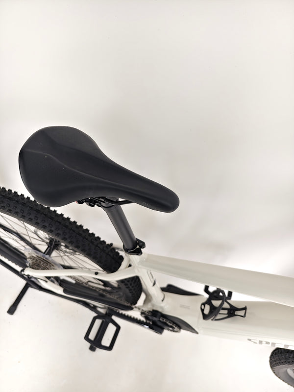 Action shot of riding the Specialized Turbo Tero 3.0 on sandy terrain, reflecting its adventure spirit.