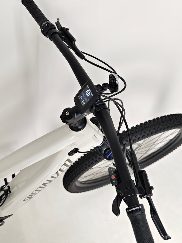 Image of the Specialized Turbo Tero 3.0 being displayed at a bike shop, showcasing its features and attractiveness.