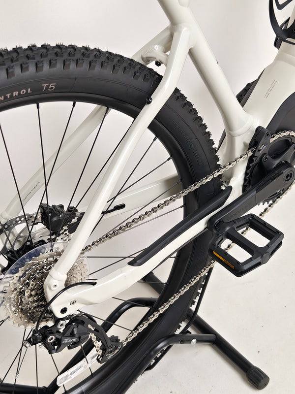 Specialized Turbo Tero 3.0 Electric MTB captured on a twisty trail showcasing its rugged capabilities.