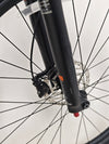 Close-up of the disc brake system on the Giant XTC SLR 29 1 Mountain Bike 2024.