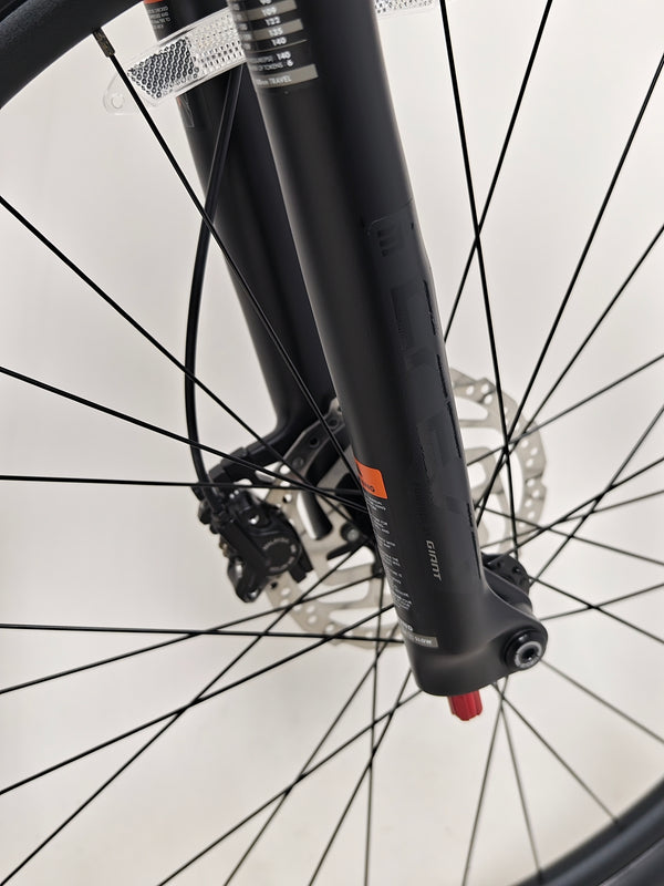 Close-up of the disc brake system on the Giant XTC SLR 29 1 Mountain Bike 2024.