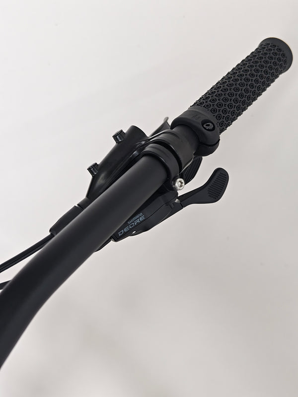 The drivetrain of the Voodoo CANZO Pro 2026 LARGE Dropper bike, focusing on Shimano Deore components that embody its functionality and Like NEW condition.