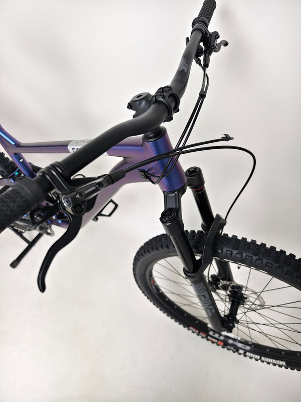 Voodoo CANZO Pro 2026 LARGE Dropper bike displayed with a scenic background, emphasizing its suitability for all-mountain riding and Like NEW condition.