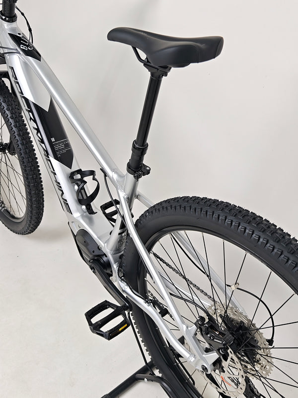 Rock Machine Blizz e60-29 electric mountain bike showing dropper seatpost and rear wheel detail.