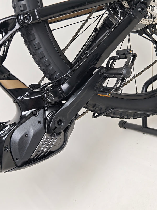 GT E Force Amp+ Full Suspension e-Bike 2024 with a backdrop, emphasizing its design features, XL frame, Yari, excellent condition, only 51 miles, at £2,250.