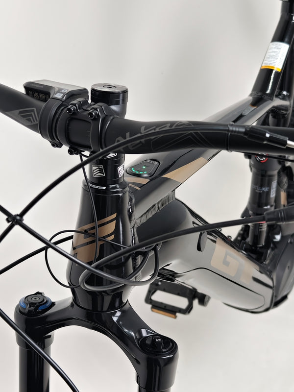 GT E Force Amp+ Full Suspension e-Bike 2024 striking visual focusing on key details with Yari features, excellent condition, only 51 miles, listed at £2,250.