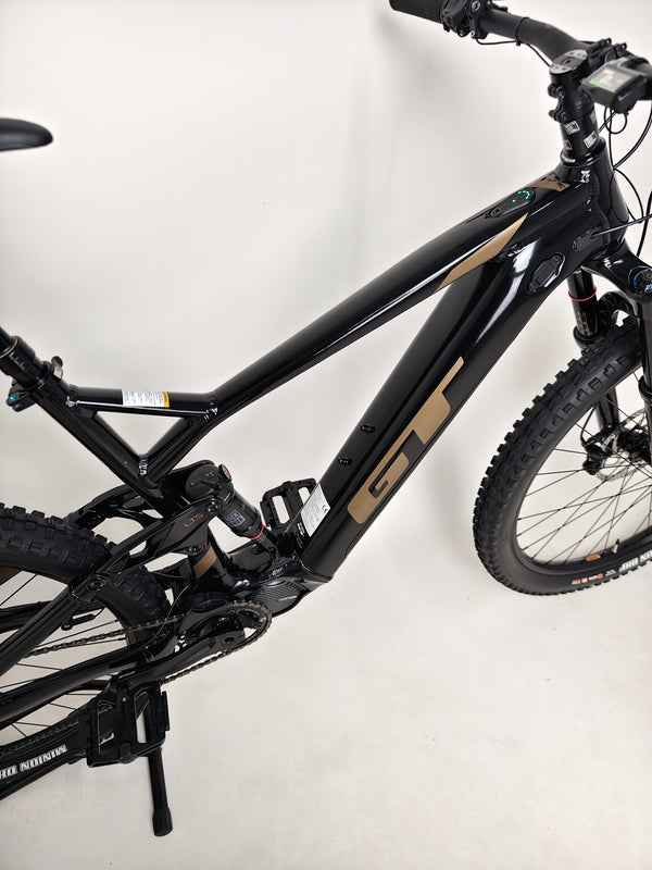 Profile view of the GT E Force Amp+ Full Suspension e-Bike 2024 exhibiting its sleek lines and Yari suspension, excellent condition, 51 miles, price £2,250.