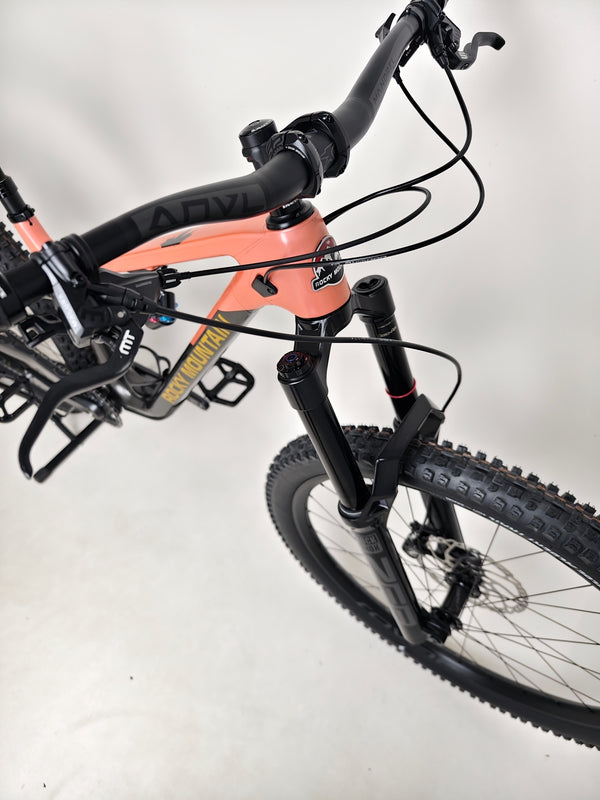 Highlighted image of the Rocky Mountain Altitude Carbon 70 2022 bike in an active setting reflecting its design and offer of £2,590.00 with free UK delivery.