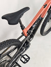 Vibrant image of the Rocky Mountain Altitude Carbon 70 2022 mountain bike captured on a trail, ready for sale at £2,590.00 with free UK delivery.