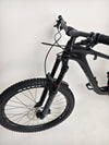 Giant Reign Advanced Pro 2 29 Carbon bike's frame quality showcased against natural backdrop, in Very Good Condition, LARGE size, RRP £4,499.00, offered at £1,790.00!