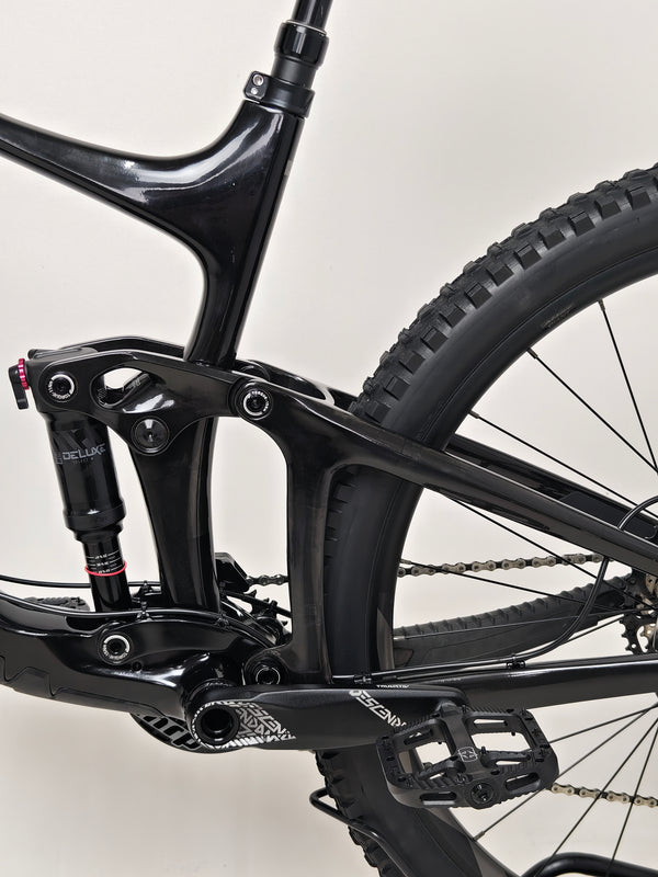 Giant Reign Advanced Pro 2 29 Carbon bike displayed on a rocky trail, highlighting its capability and design, in Very Good Condition, LARGE size, original RRP £4,499.00, now £1,790.00!