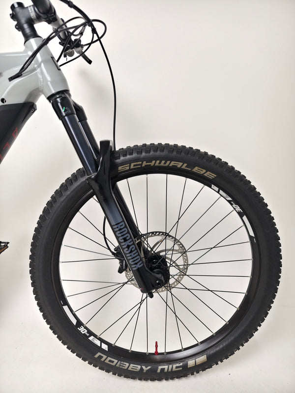 Focused view of the Shimano Deore M6100 shifters of the Haibike AllTrail 5 27.5 2022 Full Suspension e-Bike in excellent condition. Buy it for £1,870.00 at eMado!