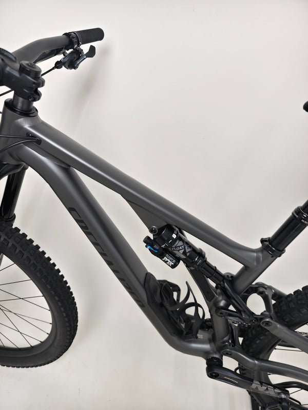 Full view of Specialized Stumpjumper EVO Comp Alloy 29 Medium S3 with sunlight reflecting off the frame.