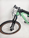 2023 Canyon Neuron 7 Full Suspension Bike stored upright, featuring a clean frame in Large size, in Very Good Condition.
