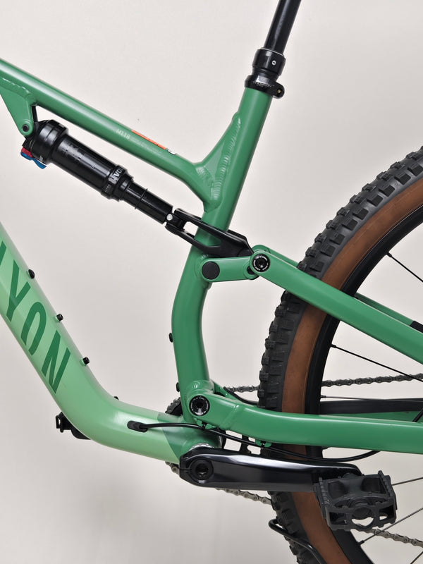 Close-up viewable parts shown on the 2023 Canyon Neuron 7 Full Suspension Bike, including wheels and tires, in Large size and Very Good Condition.