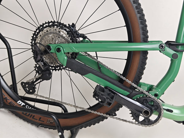 Overall compact view demonstrating the 2023 Canyon Neuron 7 Full Suspension Bike standing upright showing off its large size, in Very Good Condition.