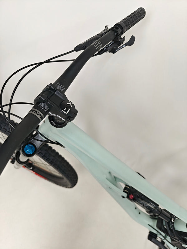 Dynamic view of Specialized Status 160 2023 Large S4 bike parked on a trail, highlighting its excellent used condition for £1,750 (RRP £2,900).