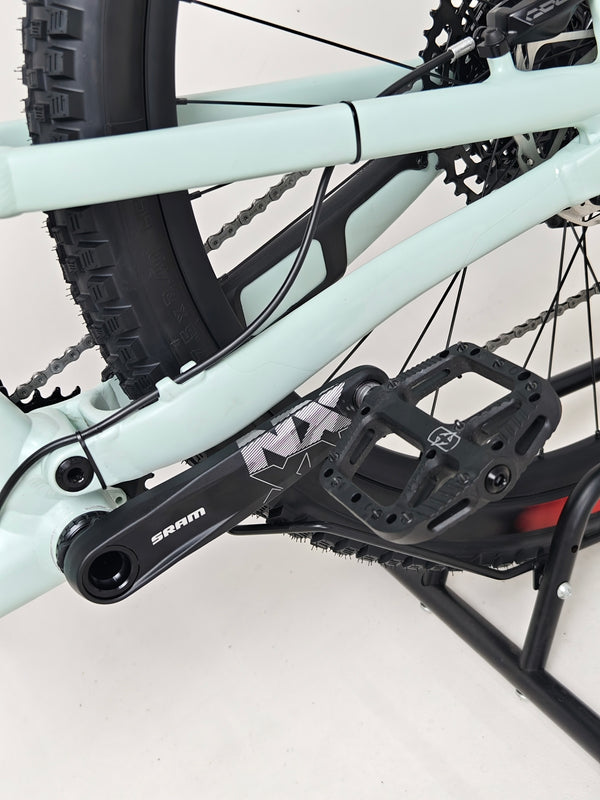 Dynamic shot of the Specialized Status 160 2023 Large S4 bike on a trail, showcasing its excellent used condition at £1,750 (RRP £2,900).