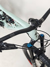 Image of the Specialized Status 160 2023 Large S4 bike in scenic terrain, emphasizing its excellent used condition for £1,750 (RRP £2,900).
