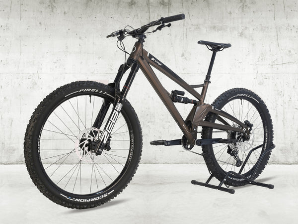 Orange ALPINE 6 Full Suspension Mountain Bike with ZEB Forks and Super Deluxe Ultimate Shock in vibrant orange color.