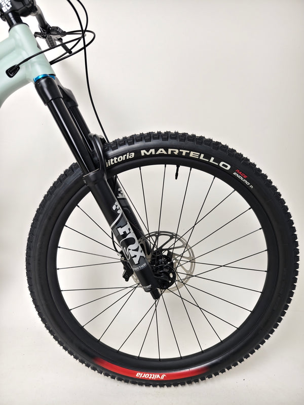 Image illustrating the Specialized Status 160 2023 Large S4 bike in a natural setting, showcasing its excellent used condition for £1,750 (RRP £2,900).