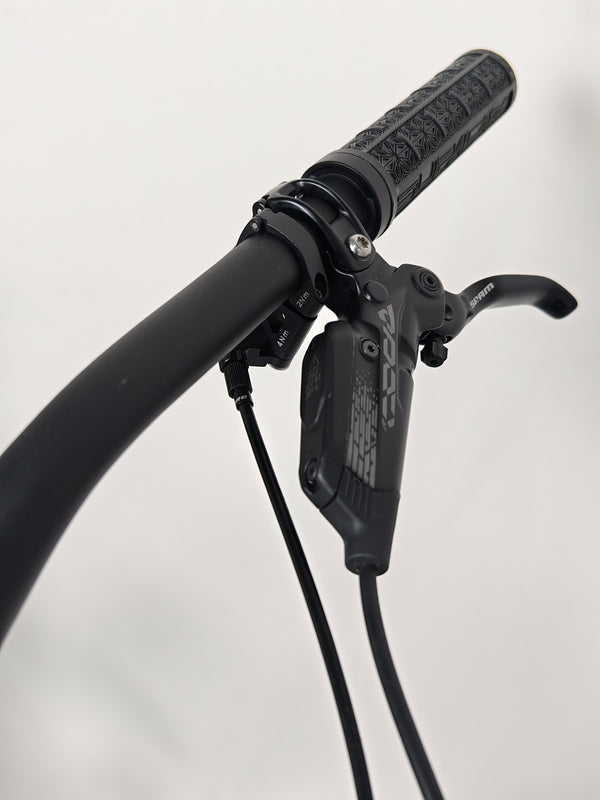 Close-up of the pedals on the Specialized Status 160 2023 Large S4, showcasing its excellent used condition for £1,750 (RRP £2,900).