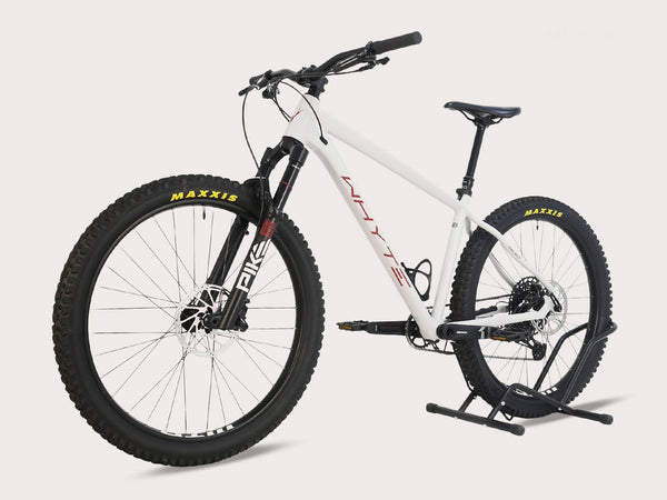 Front view of the Whyte 905 V5 2023 Mountain Bike, showcasing its sleek design and high-quality suspension.
