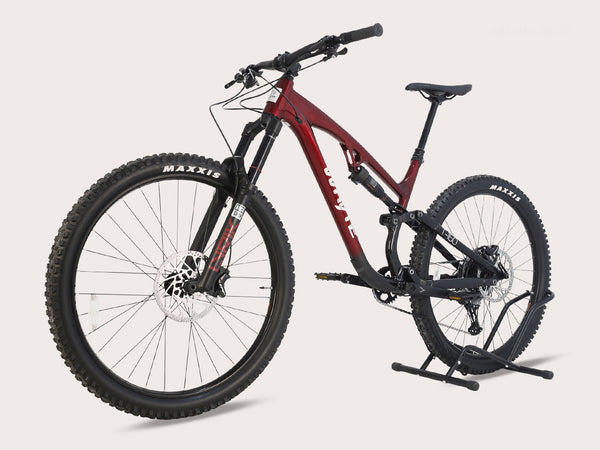 Close-up of the frame of the Whyte T-160 S 2025 with glossy metallic red finish, highlighting its high-quality 6061 Alloy construction.