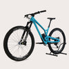 Evil Offering V1 carbon fiber full suspension bike in blue color, standing on a bike stand.